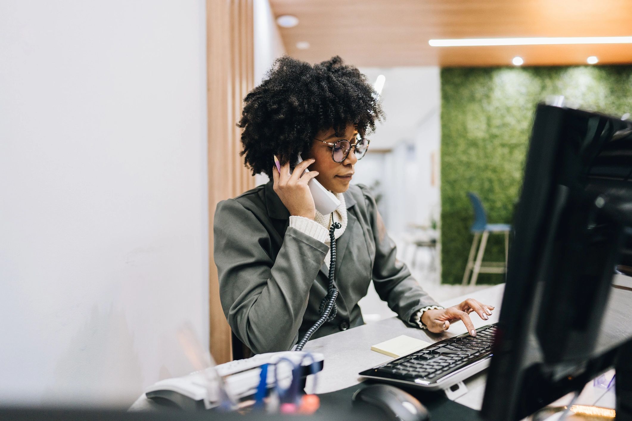 Customer support representative speaking on the phone